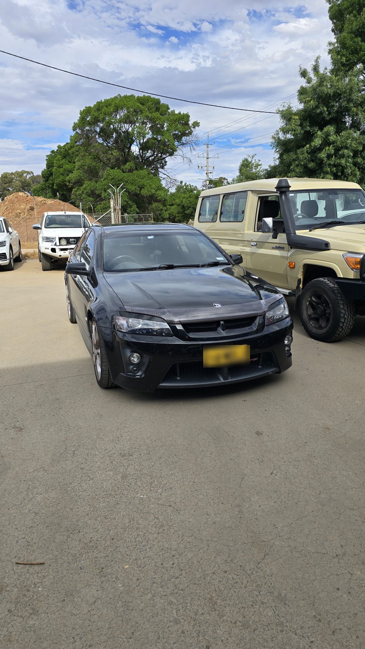 A customer's car in the yard at Farronato Autobody Repairs, Griffith